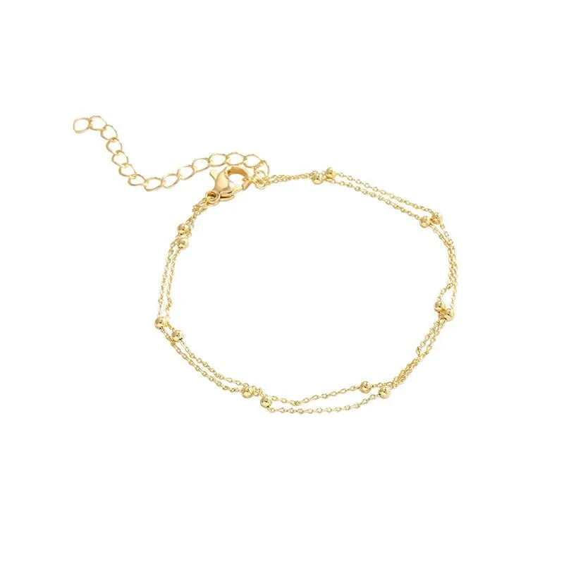 Bracelet à petites boules dorées ajustable - Sereine